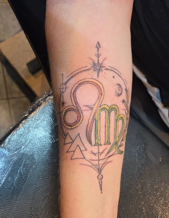 Fine-line astrological tattoo