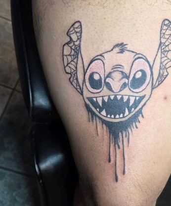 Cartoon character linework tattoo